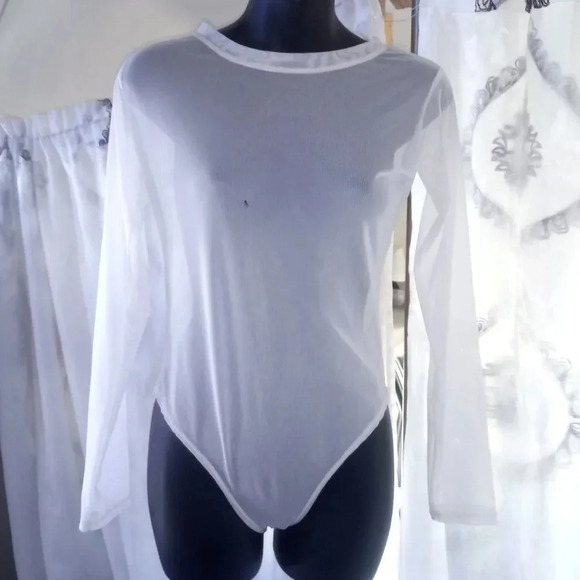 *Bodysuit size medium and large (box 1) - Picture 1 of 3